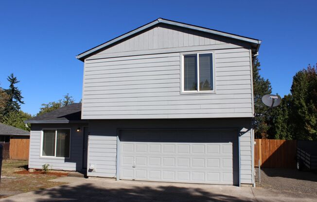 4 BR, 2 1/2 BA home with fenced yard in quiet Aloha neighborhood