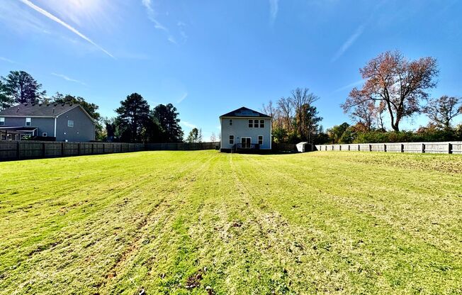 Newer Home On 3 Acres! Landscaping, Electric, Water, & Sewer Included In Price! Pet Friendly - Attached Garage w/Opener - Storage Shed!