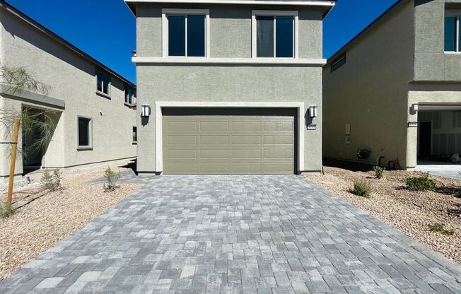 Brand new never lived in home in vibrant South West Las Vegas with open concept living room and kitchen with island and brand new appliances!