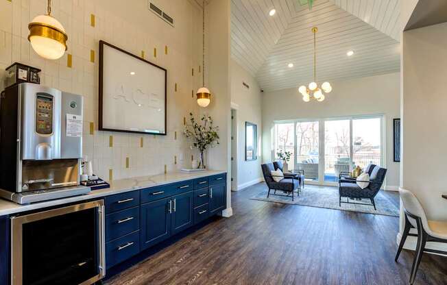 A kitchen with dark wood floors and a white ceiling.