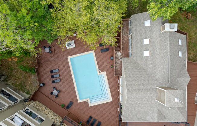 arial view of a house with a swimming pool