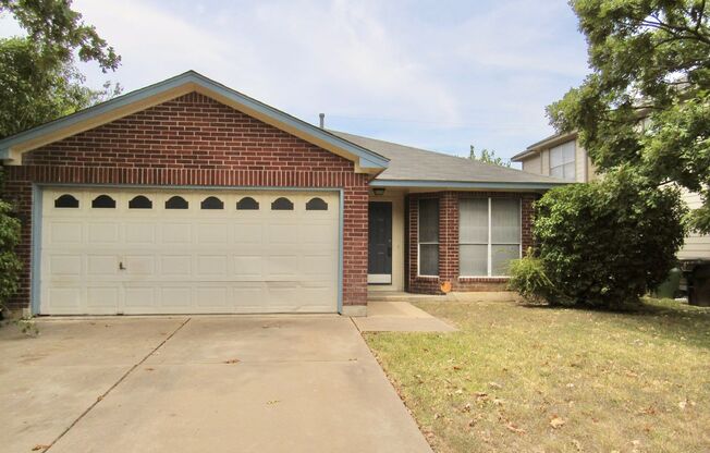 Cozy 3/2/2 one story with fence yard just west of I-35!