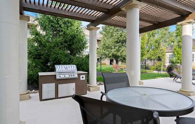 The Fairways at Corbin Park poolside cabana with BBQ grill and seating