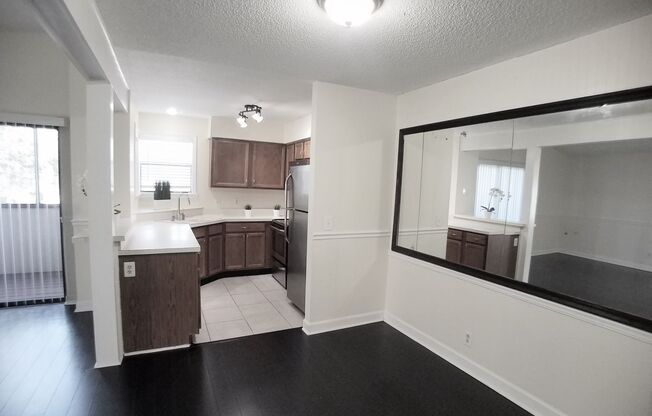 Beautiful 1/1 wood floor condo for rent in front of Full Sail !