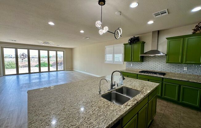 Immaculate Rhodes Ranch Golf Course Community home with a contemporary open floorplan