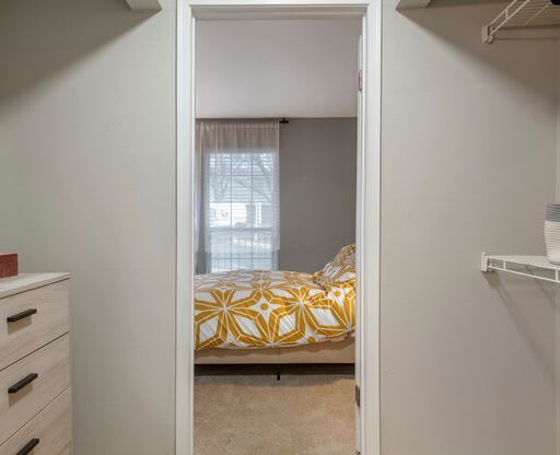 a bedroom with a bed and a closet at Elme Alexandria, Virginia, 22304