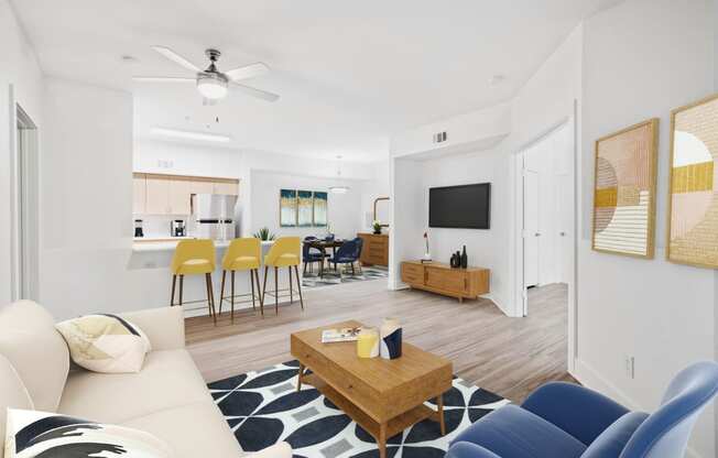 A living room with modern decor and plank flooring