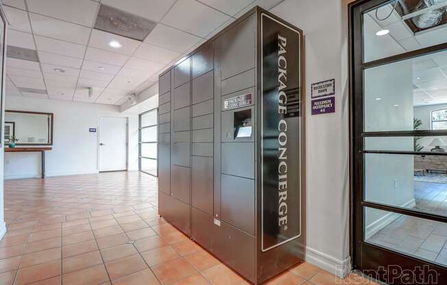 a stainless steel elevator in a lobby of a building