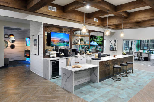 a large kitchen with a large island and a television at Willowest in Collier Hills, Atlanta, GA, 30318
