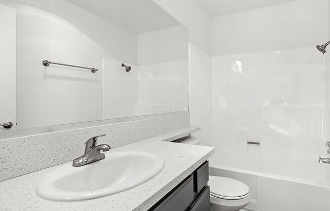 Modern styled bathroom with shower and tub.