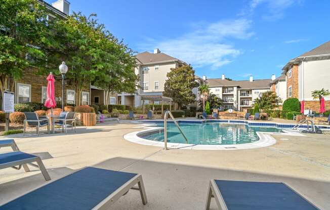 the preserve at ballantyne commons pool with apartment buildings