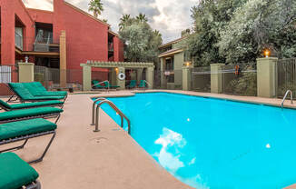 El Dorado Area large sparkling pool with lounge chairs. 