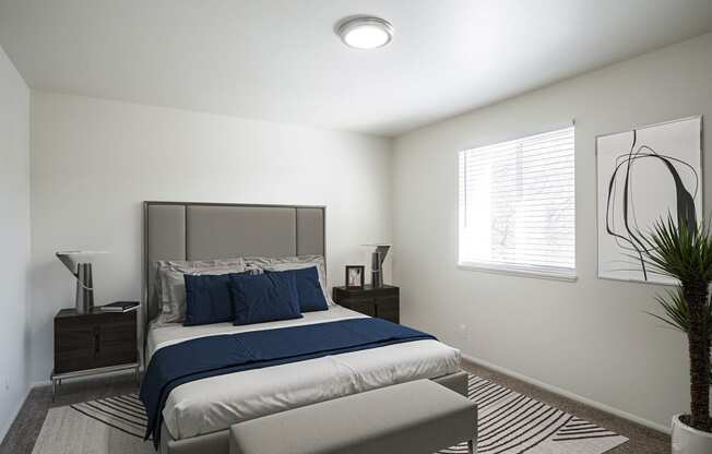 a bedroom with a bed and two night stands at Summit, Pocatello, ID
