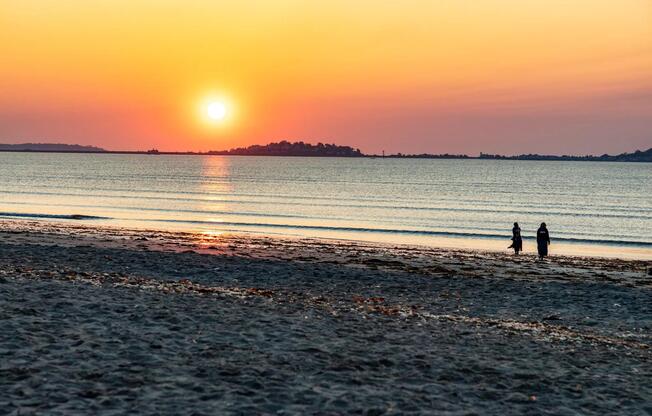 Revere Beach sunsets set the tone for tranquil evenings, with golden skies and gentle waves just steps from home.