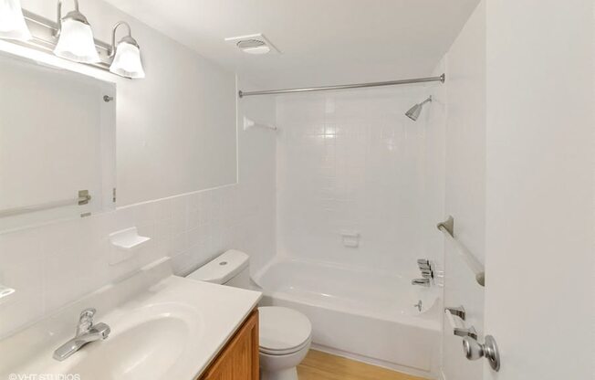 Large Soaking Tub In Master Bathroom with A Tile Surround at The Forest, Rockville