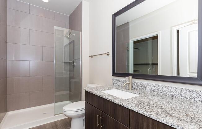 a room with a sink and a mirror