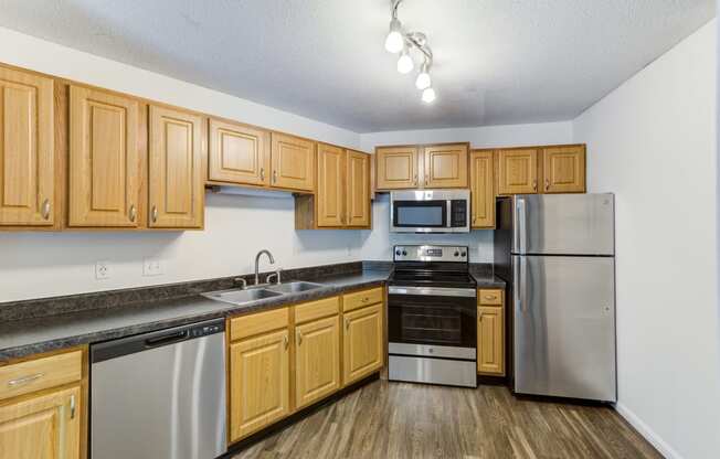 the preserve at ballantyne commons apartment kitchen with stainless steel appliances