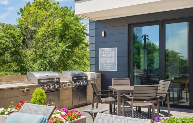 two bbq grills on the patio at Knox Heights in Dallas, TX