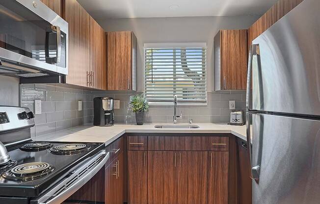 Fully Equipped Kitchen at Colonial Garden Apartments, California