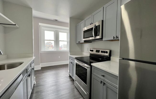 2 beds, 2 baths, 933 sqft, $2,015, Unit 703