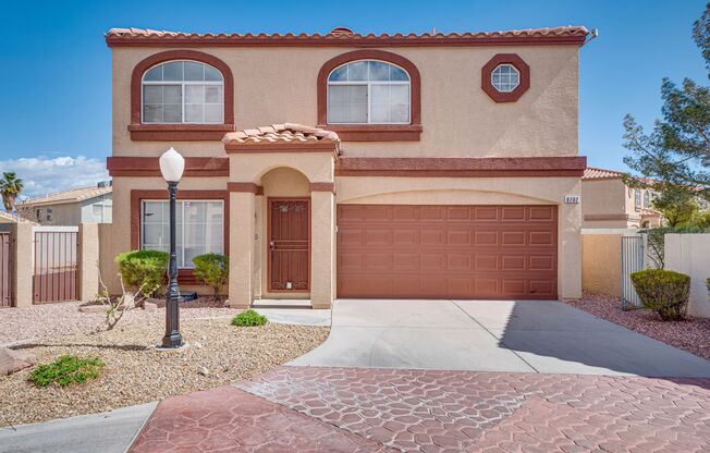 Two story home in gated neighborhood with 2 community pools.  Three bedrooms, 2.5 bathrooms, 2 car garage.