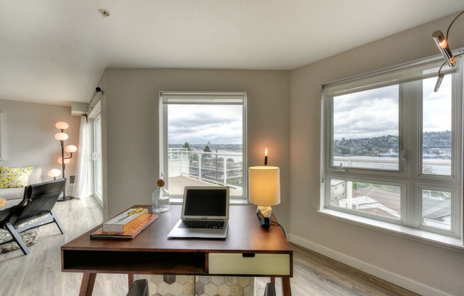 Office Area with Desk, Laptop, Windows and Hardwood Inspired Floor