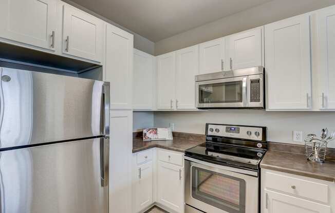 a kitchen with a stove and a counter top