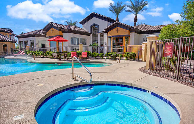 A pool with a slide in the middle of it.