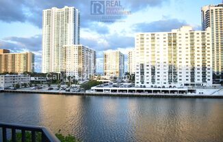 Experience Coastal Luxury: Premier 2 Bed/2 Bath Condo with Spectacular Waterfront Views!