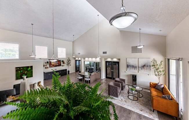 A modern living room with a large couch and a coffee table.