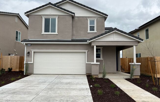 Be the first to live in this beautiful two-story home in RIVERSTONE