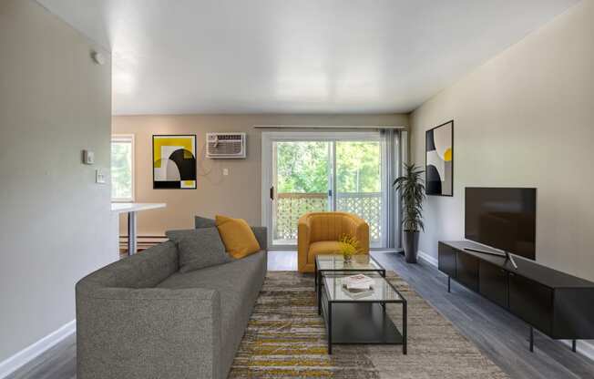 a living room with a couch and a coffee table