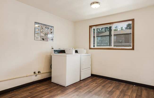 a laundry room with a washer and dryer