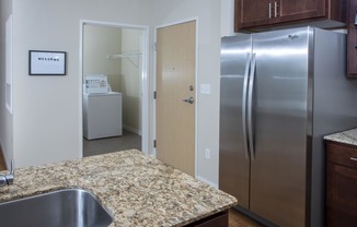 In Unit Washer Dryer in Room Next to Kitchen