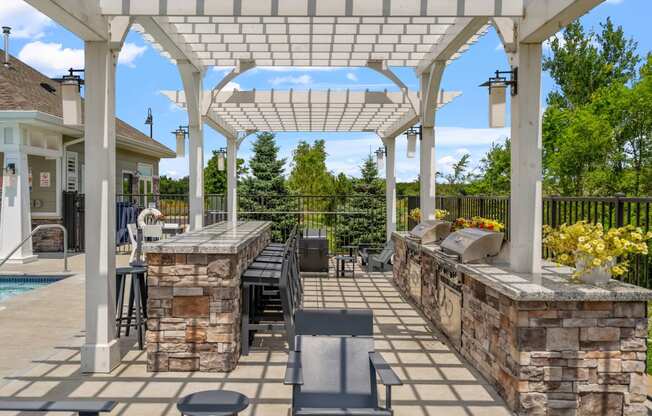 Outdoor Grilling Area Near Pool