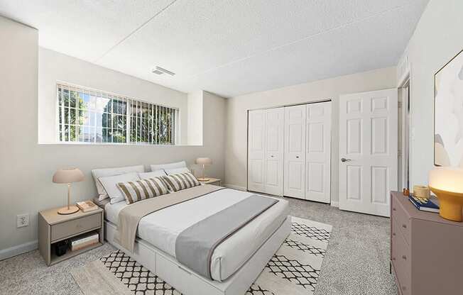 Model Bedroom with Carpet and Closet at Heights Marlborough Apartments in Boston, MA.
