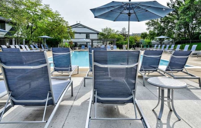 Poolside Relaxing Chairs at The Villas at Northstar Apartments in Ann Arbor, MI