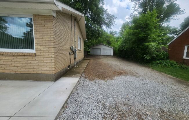 Beautiful and spacious 3 bedroom 1 bath home with large detached garage and updates!