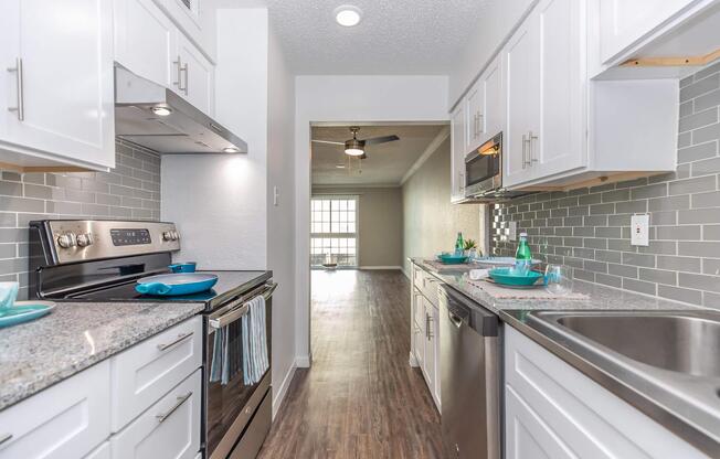 FULLY-EQUIPPED KITCHENS AT THE ARTS APARTMENTS AT OCEAN DRIVE