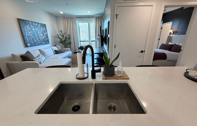 Top‑Floor Corner Condo with Downtown Views — Stylish, Pristine, and Steps From Everything