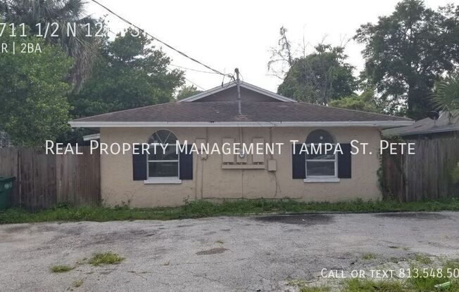 8711 1/2 N 12 ST
