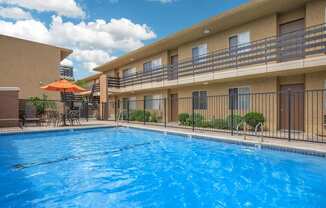 the swimming pool at the resort at glade springs at Villa La Paz Apartments, Bellflower, CA, 90706