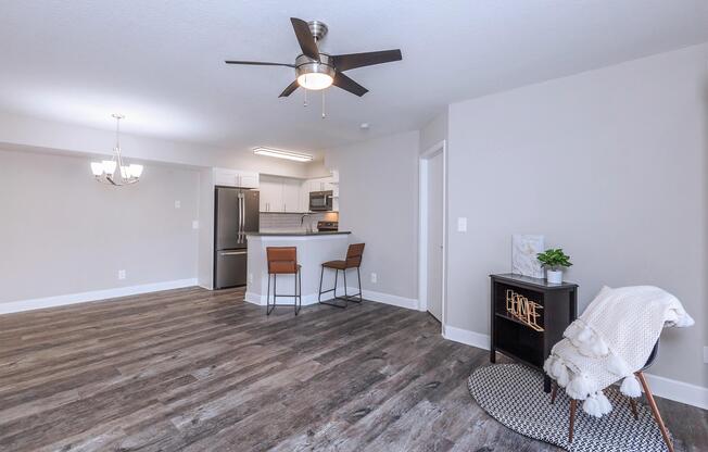a living room filled with furniture and a fireplace