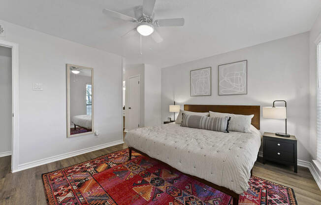 Bedroom with cozy bed at Lakeside Apartments, Texas, 75231