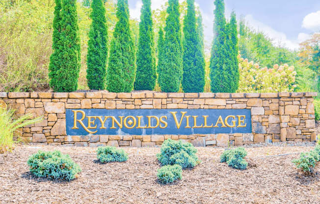 The Lofts at Reynolds Village monument sign at entrance of community