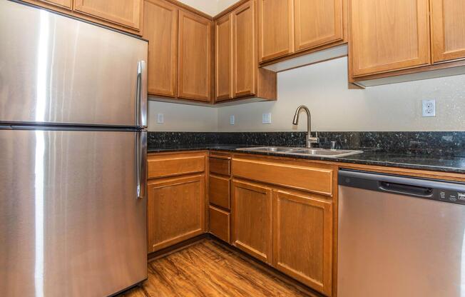 a stainless steel refrigerator in a kitchen