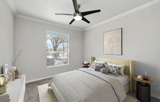 Model Bedroom with Carpet and Window View at Chapel Hill Apartments in Lewisville, TX.
