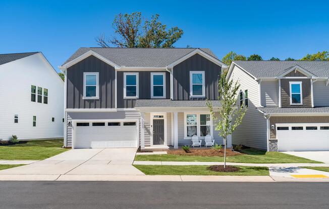 Spacious detached homes feature attached two-car garages, covered front porches, private driveways, and professionally maintained landscaping that enhance the comfort and convenience of single-family living.