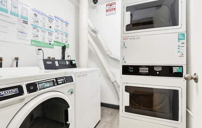 A white oven with the number 3 on it is in a room with a washing machine.