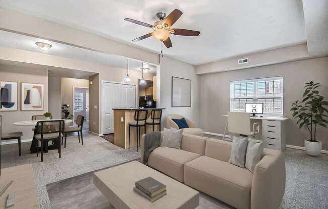 An end style living room with a beige couch, an extra window, and a ceiling fan at Lynbrook Apartments and Townhomes, Elkhorn, NE, 68022